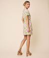 Model is wearing UNTUCKit Multi Leaf Short Sleeve A-line Julie Shirtdress.