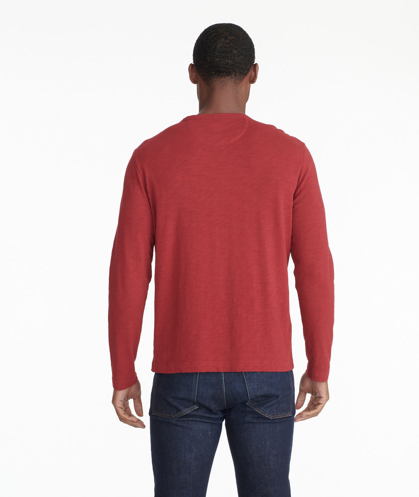 Model wearing a Bright Red Long-Sleeve Pocket Tee