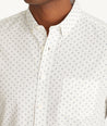 Model wearing an UNTUCKit White Cotton Printed Short-Sleeve Logan Shirt