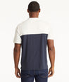 Model wearing an UNTUCKit Navy No Sweat Polo with Colorblock