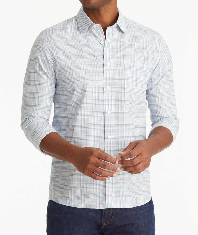 Model wearing an UNTUCKit Blue Wrinkle-Free Magliocco Shirt