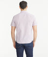 Model is wearing UNTUCKit Micro Red White & Blue Check Cotton Short-Sleeve Mayfield Shirt.
