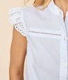 Model is wearing UNTUCKit white and blue Flutter Sleeve Cotton Clip Dot Meg Shirt.