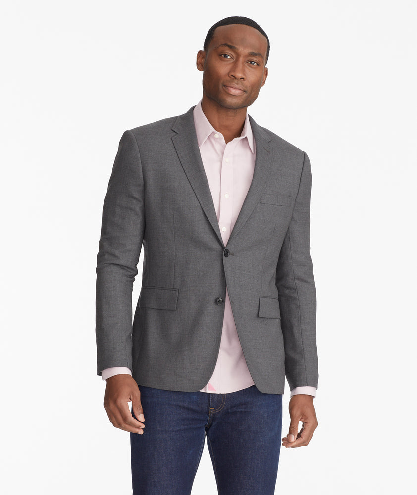 Model wearing an UNTUCKit Grey Wrinkle-Resistant Palazzo Sport Coat