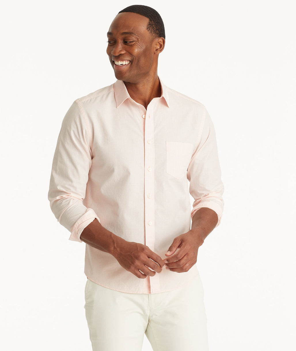 Model wearing an UNTUCKit Pink Vintage Wash Pelkey Shirt