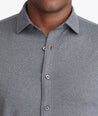 Model wearing a Grey Performance Luxe Tee Hybrid Shirt