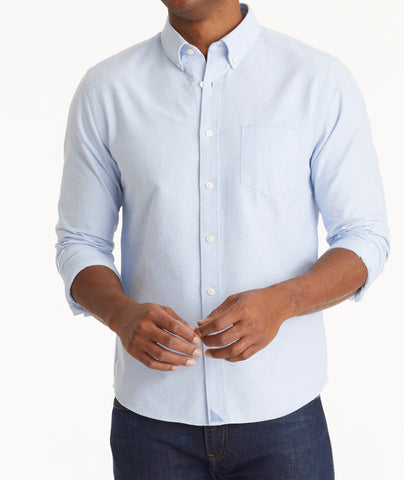 Model wearing an UNTUCKit Light Blue Oxford Picardan Shirt