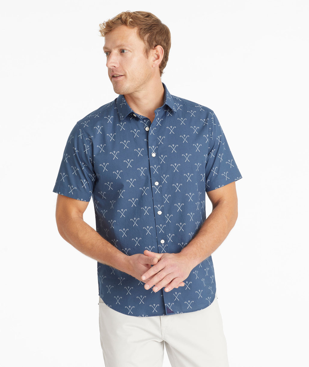 Model wearing an UNTUCKit Navy Cotton Printed Short-Sleeve Pinhel Shirt