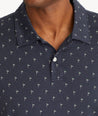Model wearing an UNTUCKit Navy No Sweat Polo with Pattern