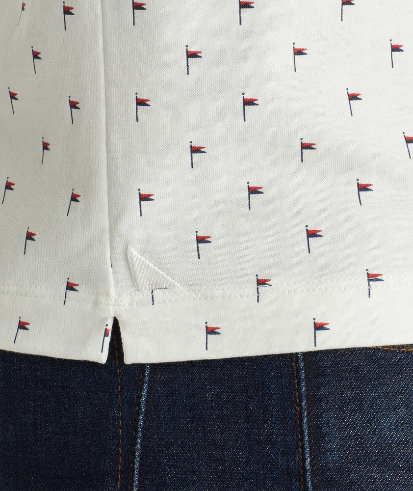 Model wearing an UNTUCKit White No Sweat Polo with Pattern