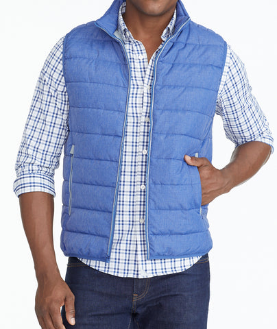 Model wearing a Blue Puffer Vest