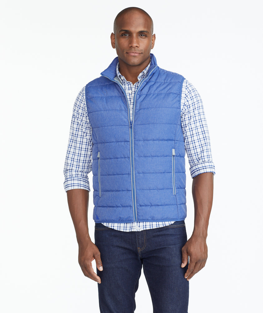 Model wearing a Blue Puffer Vest