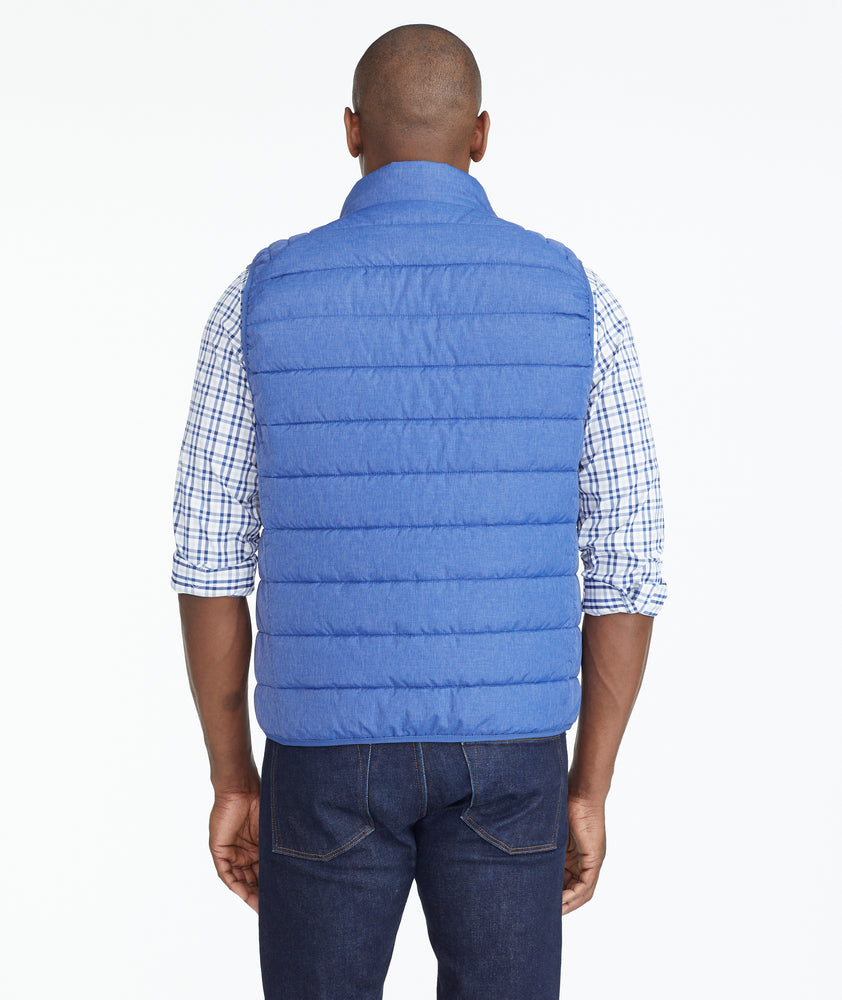 Model wearing a Blue Puffer Vest