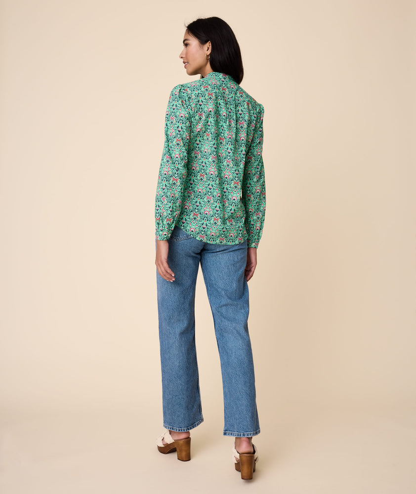 Model wearing an UNTUCKit Regina Shirt.