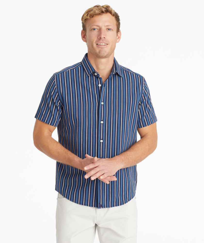 Model wearing an UNTUCKit Blue Cotton Printed Short-Sleeve Ryder Shirt