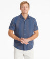 Model wearing an UNTUCKit Blue Cotton Printed Short-Sleeve Ryder Shirt