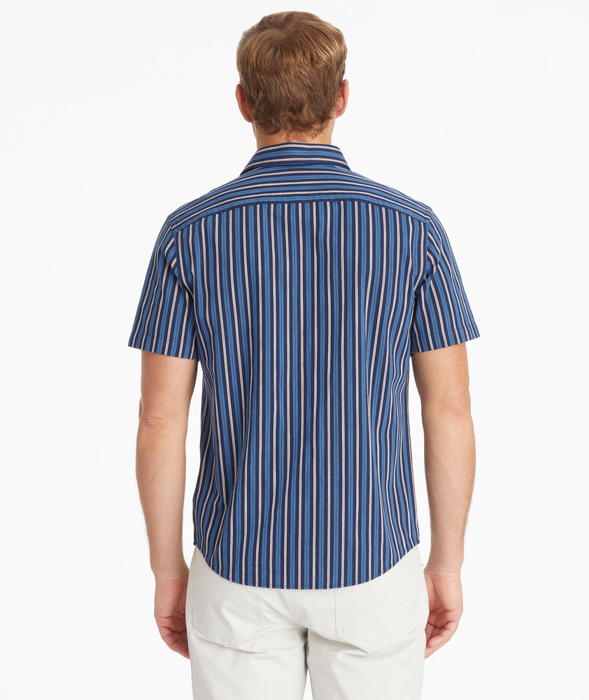 Model wearing an UNTUCKit Blue Cotton Printed Short-Sleeve Ryder Shirt