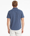 Model wearing an UNTUCKit Blue Cotton Printed Short-Sleeve Ryder Shirt