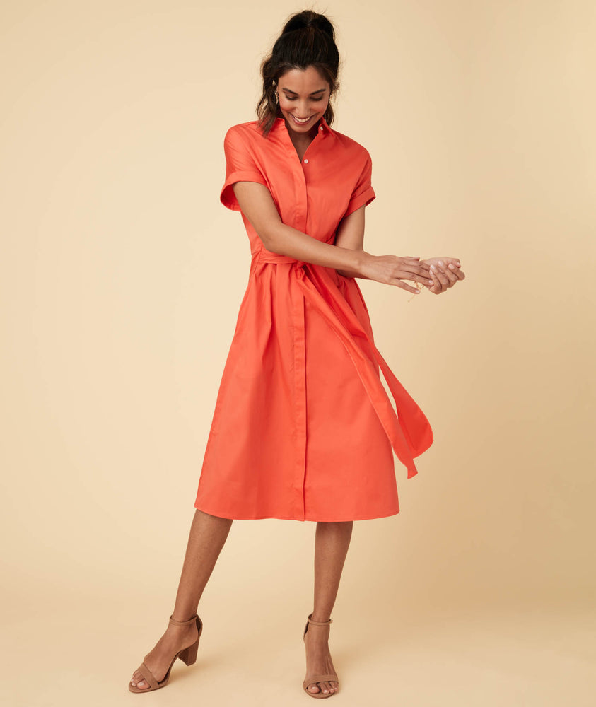 Model wearing a Orange Sage Dress