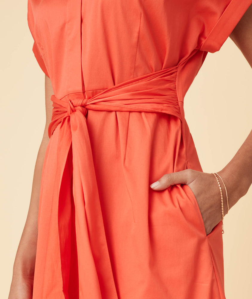 Model wearing a Orange Sage Dress