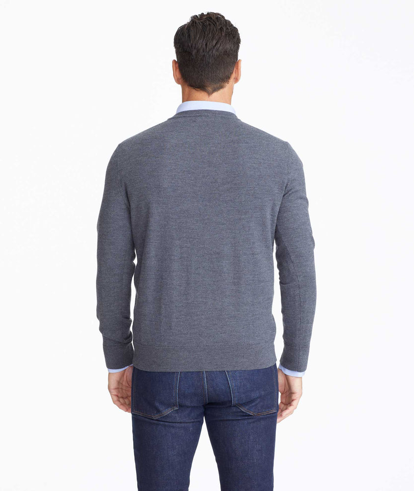 Model wearing a Dark Grey Merino Wool V-Neck Sweater