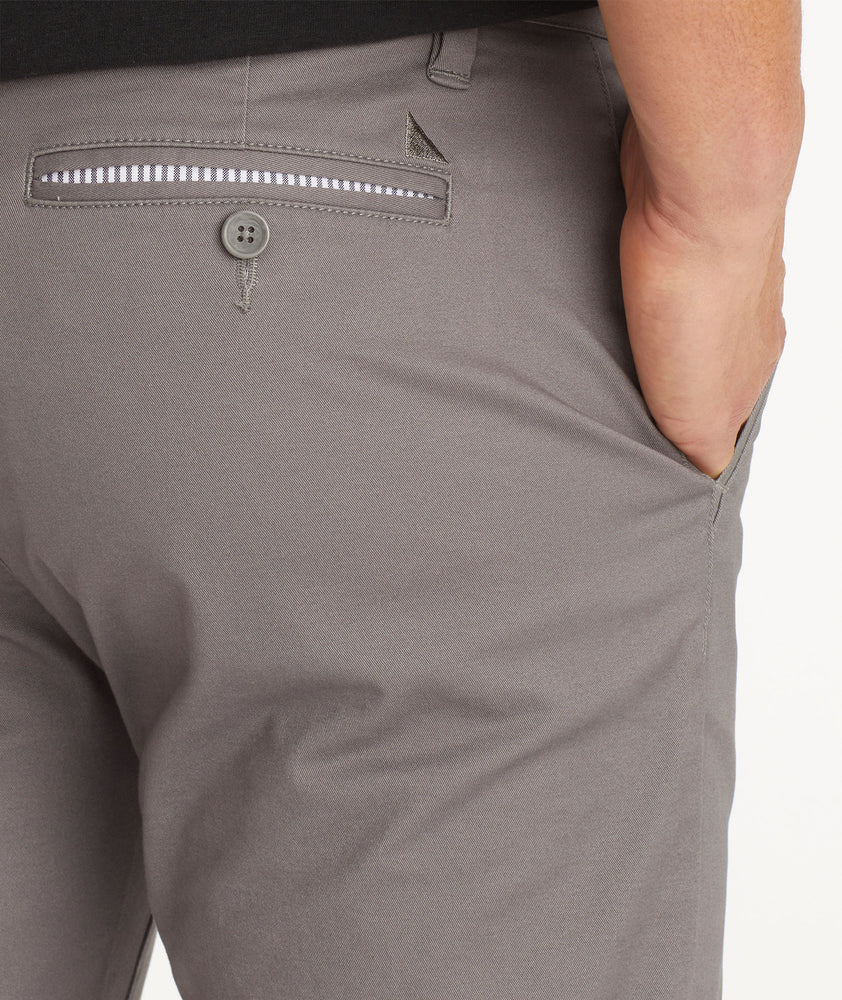 Model wearing UNTUCKit Grey Chino Pants