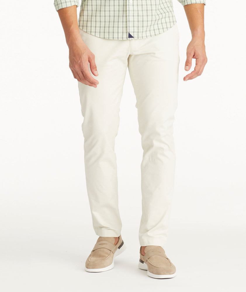 Model wearing UNTUCKit Stone Chino Pants