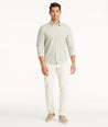 Model wearing UNTUCKit Stone Chino Pants