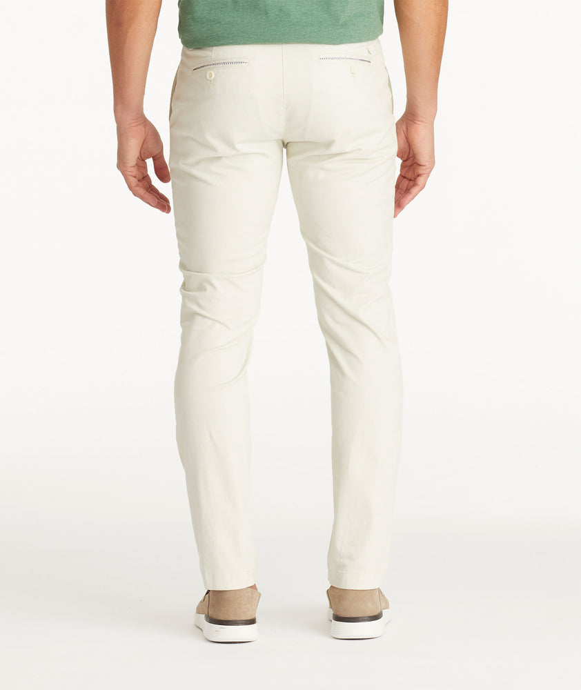 Model wearing UNTUCKit Stone Chino Pants