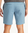 Model wearing UNTUCKit Mid Blue 9" Chino Shorts