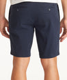 Model wearing UNTUCKit Navy 9" Chino Shorts