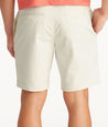 Model wearing UNTUCKit Stone 9" Chino Shorts