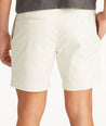 Model wearing UNTUCKit Stone 7" Chino Shorts