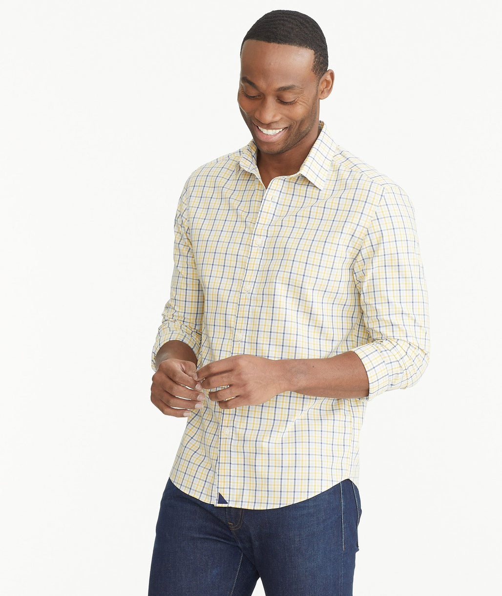 Model is wearing Yellow & Navy Check Wrinkle-Free Sumoll Shirt.
