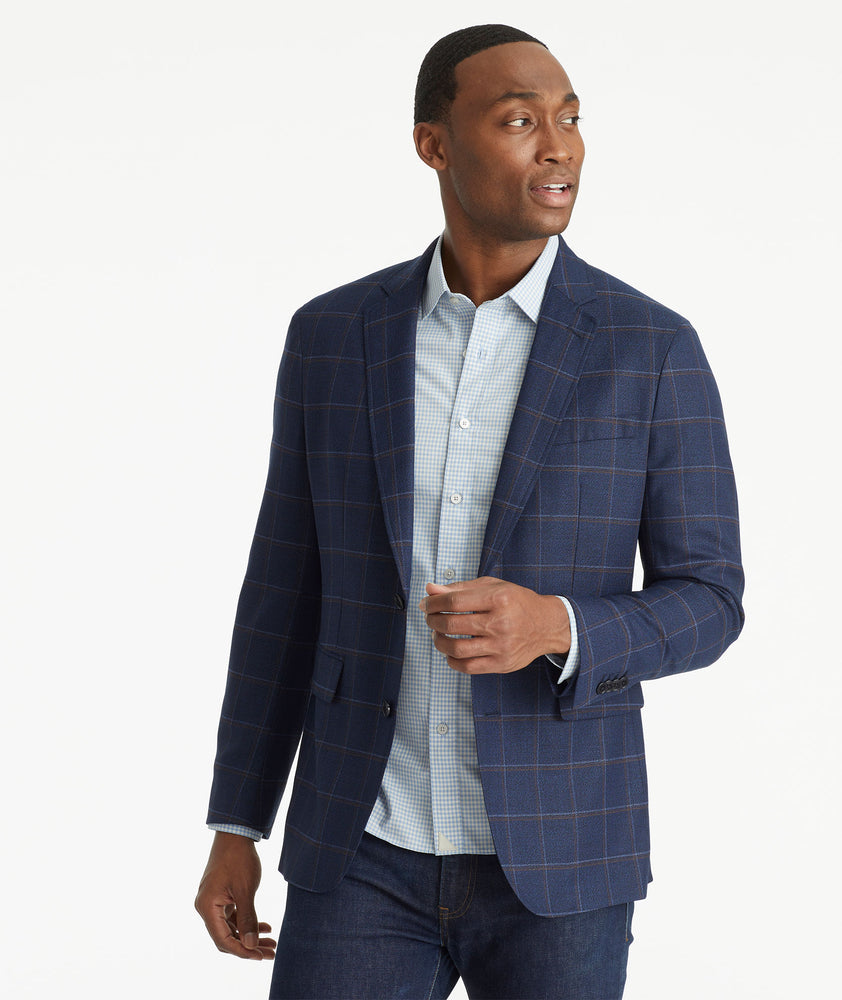 Model wearing an UNTUCKit Navy Italian Wool Tavernello Sport Coat