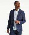 Model wearing an UNTUCKit Navy Italian Wool Tavernello Sport Coat