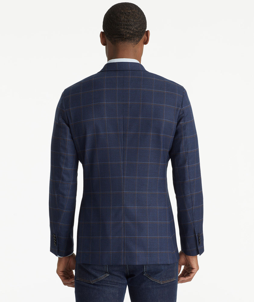 Model wearing an UNTUCKit Navy Italian Wool Tavernello Sport Coat