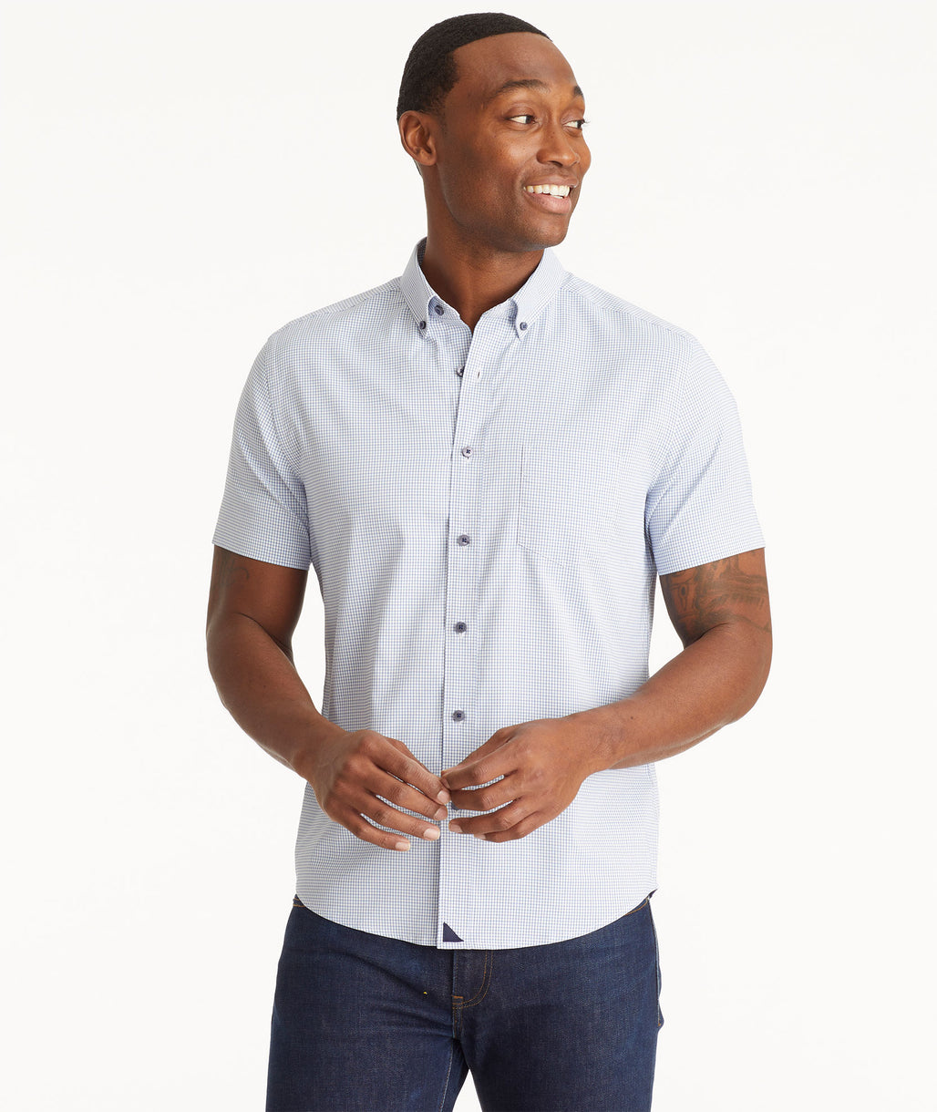 Model wearing an UNTUCKit Blue Wrinkle-Free Performance Short-Sleeve Terrero Shirt