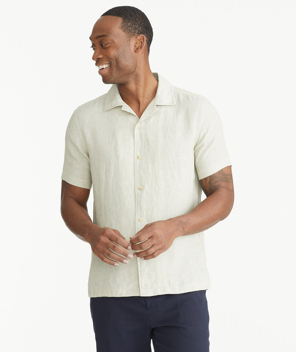 Model wearing an UNTUCKit Tan Linen Short-Sleeve Touriga Shirt.
