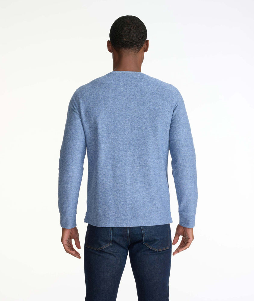 Model wearing a Blue French Terry Long-Sleeve Henley