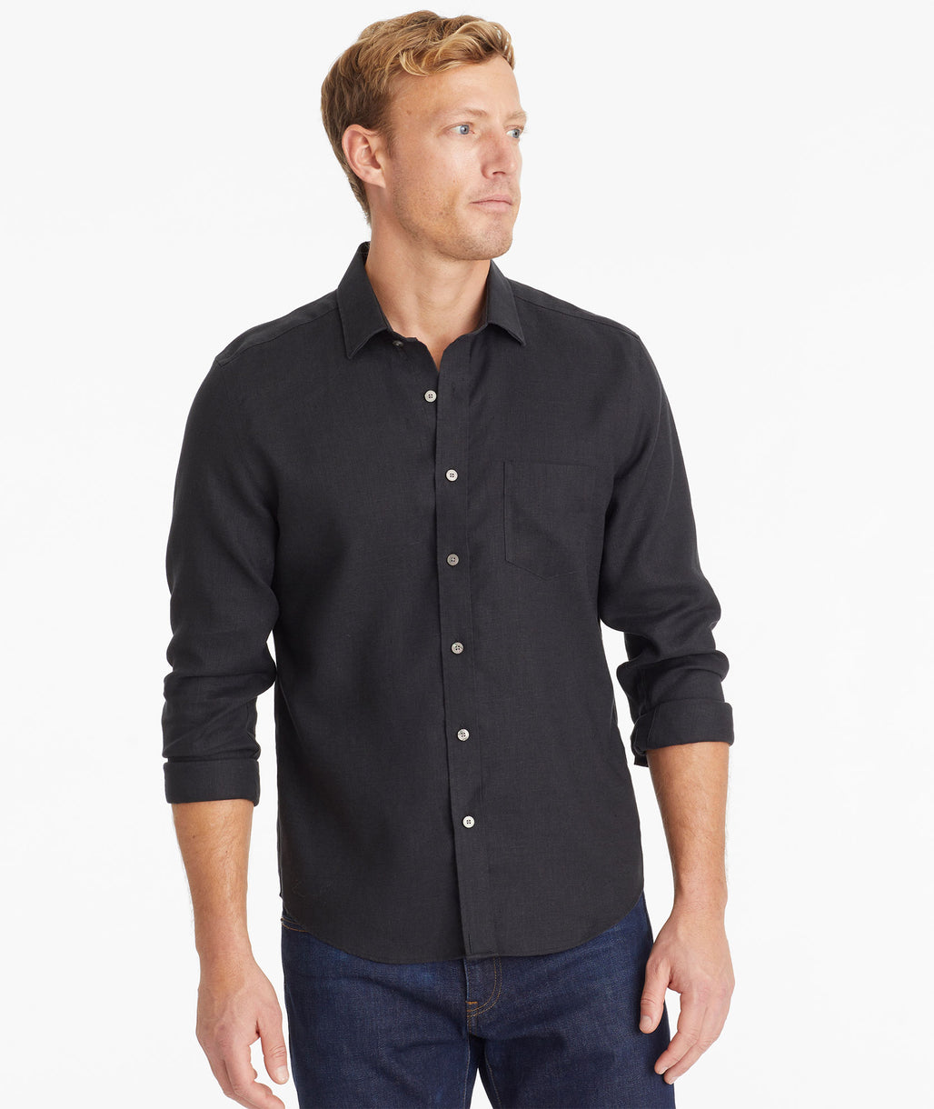 Model wearing an UNTUCKit Black Wrinkle-Resistant Linen Vin Santo Shirt
