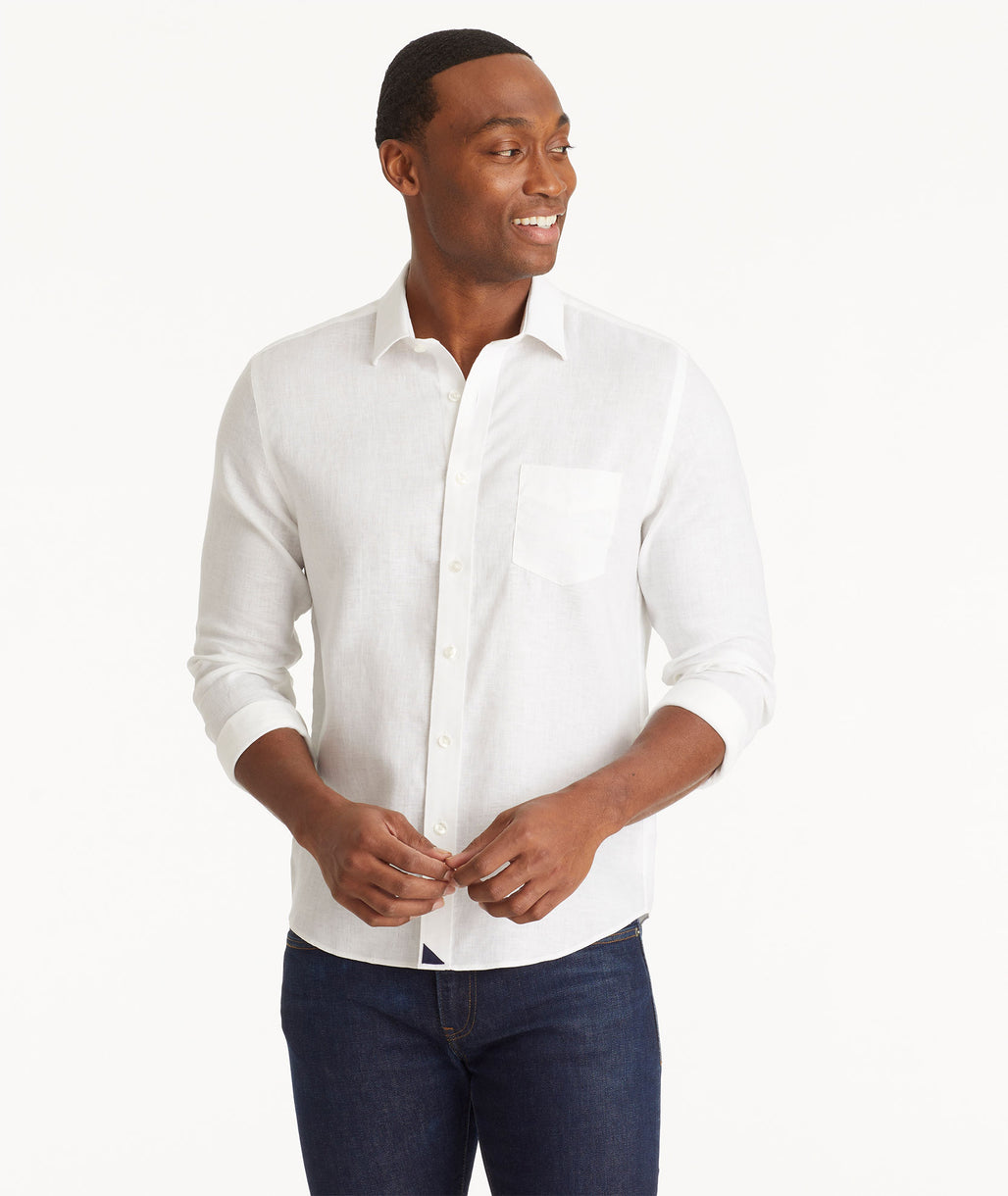 Model wearing an UNTUCKit Bright White Wrinkle-Resistant Linen Vin Santo Shirt