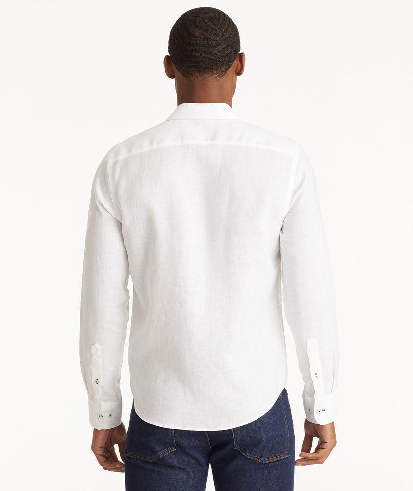 Model wearing an UNTUCKit Bright White Wrinkle-Resistant Linen Vin Santo Shirt