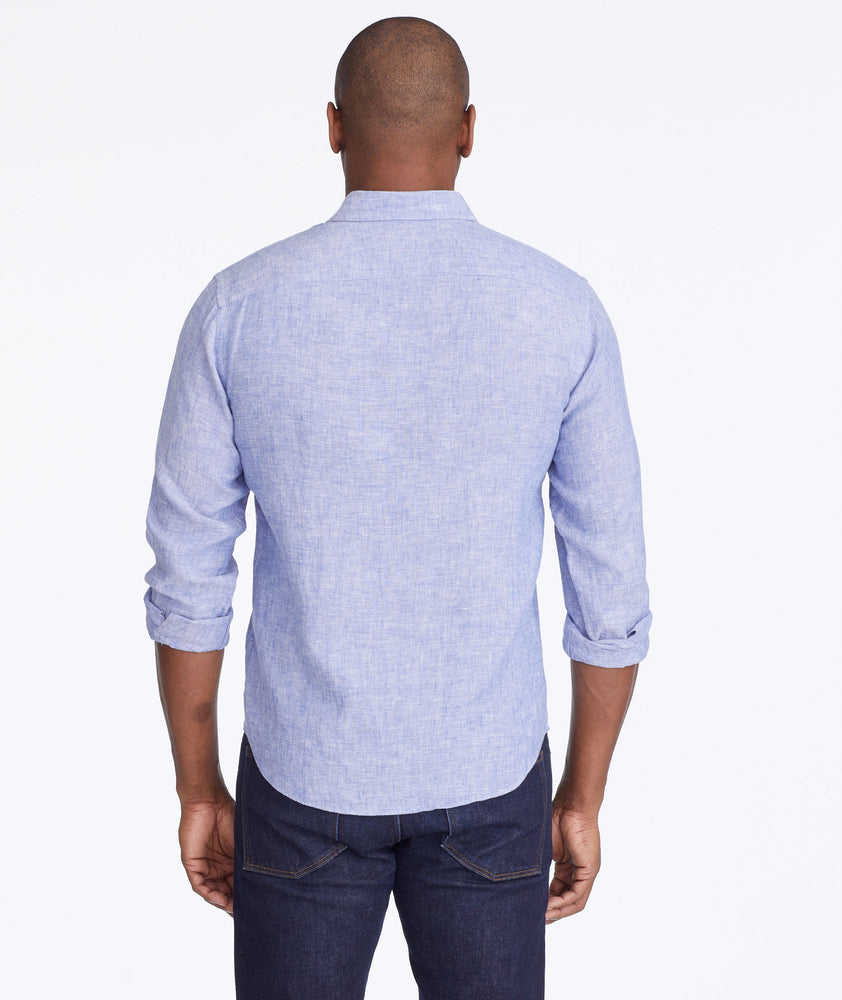 Model wearing a Blue Wrinkle-Resistant Linen Vin Santo Shirt