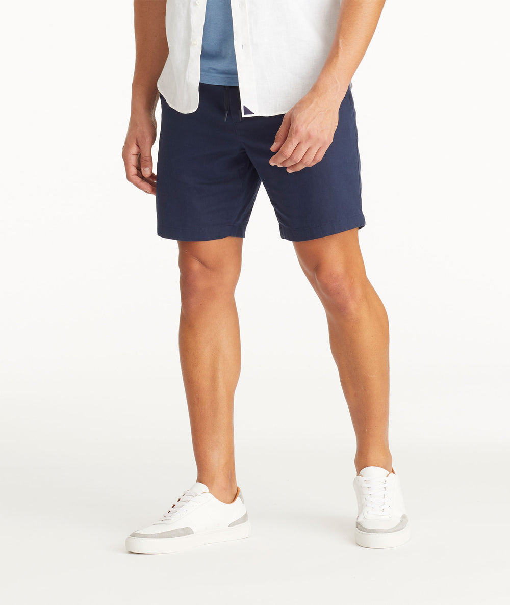 Model wearing UNTUCKit Navy Drawstring Shorts
